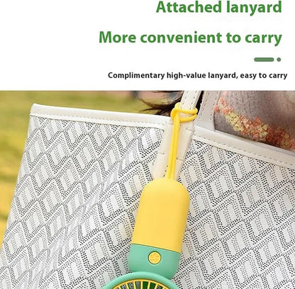 Yellow and green handheld device with attached lanyard on a white background
